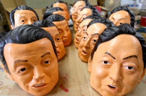 rubber masks of MP Hatoyama (right) and ex-MP Asou (left)